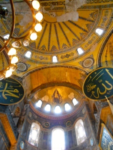 The interior of the Hagia Sophia showing the mix of Christian and Islamic uses